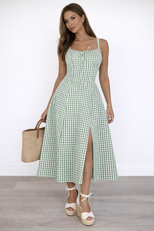 green gingham midi dress front view with fitted bodice and side slit