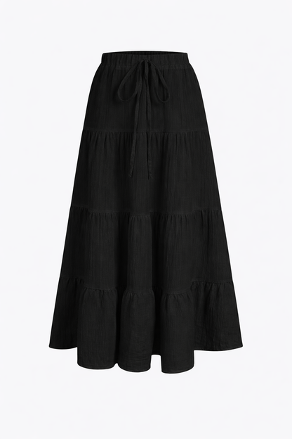Black cotton tiered maxi skirt — studio front view — RIVI